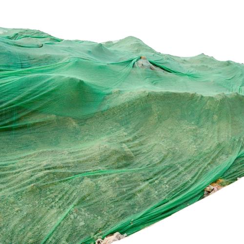 Fungsi jaring pencegahan bledug ing situs konstruksi